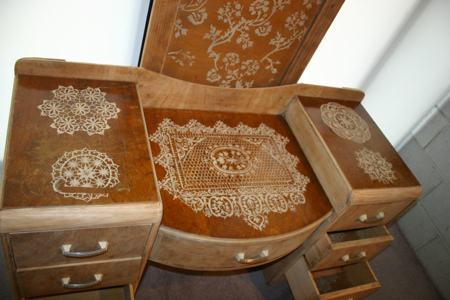 Hannah Bertram. The silence becoming and disappearing - Pomonal (detail). wood sanding dust, dresser, 2012. Courtesy of the artist