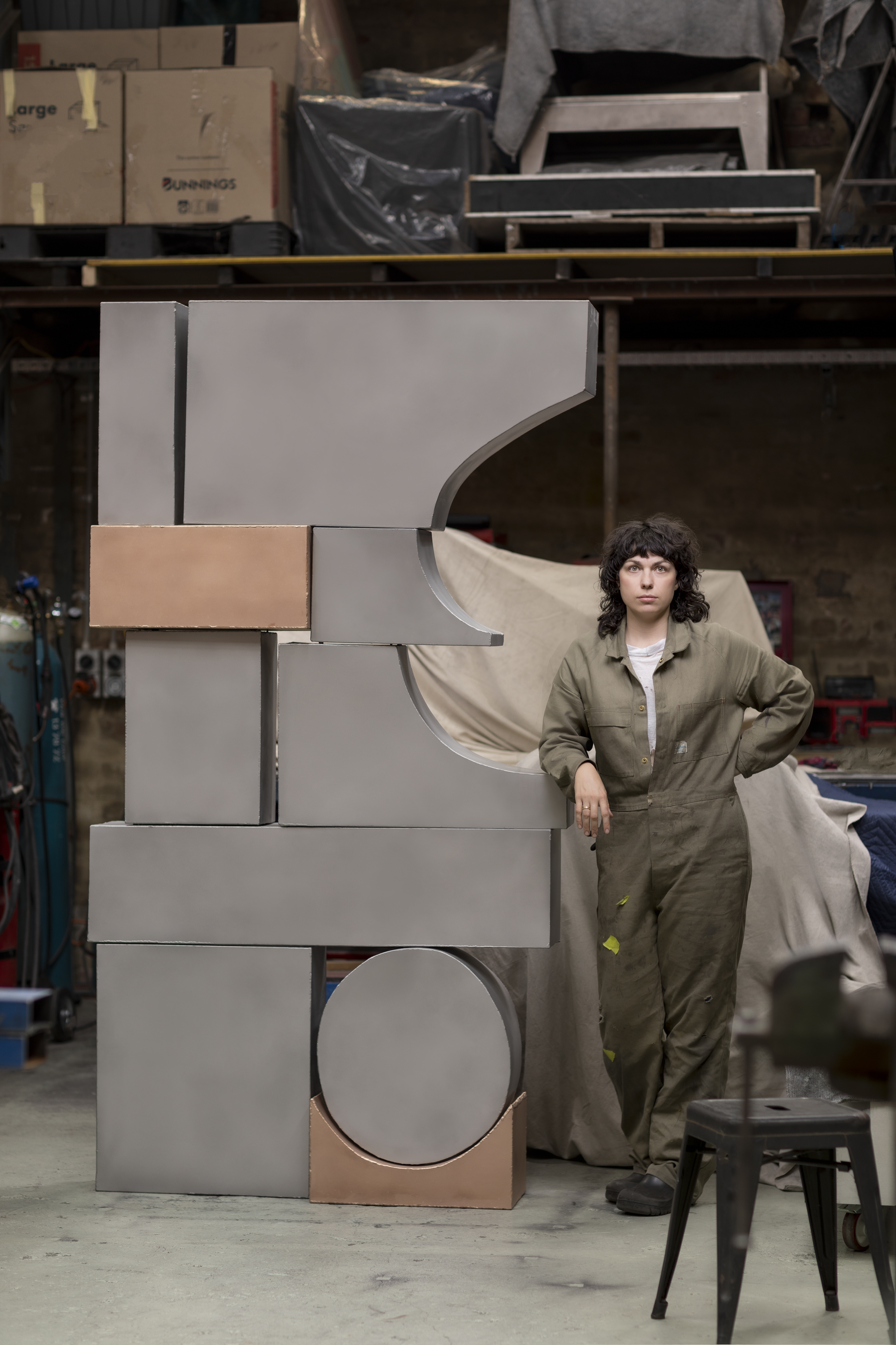 Augusta in her studio December 2024, with An arrangement of forms II, 2024. Collection Cbus. (Photo: Andrew Curtis)