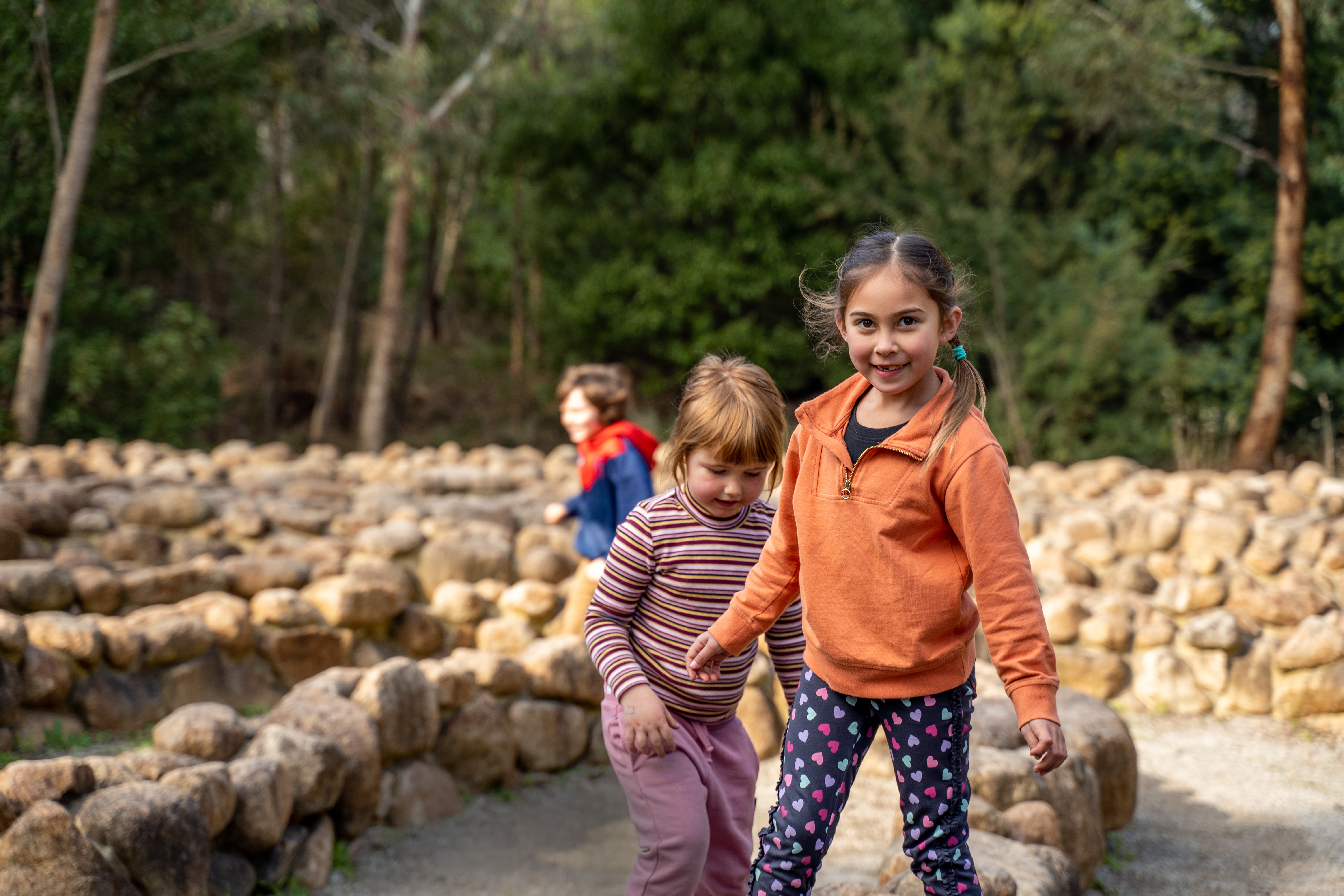 Children with Andrew Rogers' <em>The winding path, the search for truth</em>, 2010.